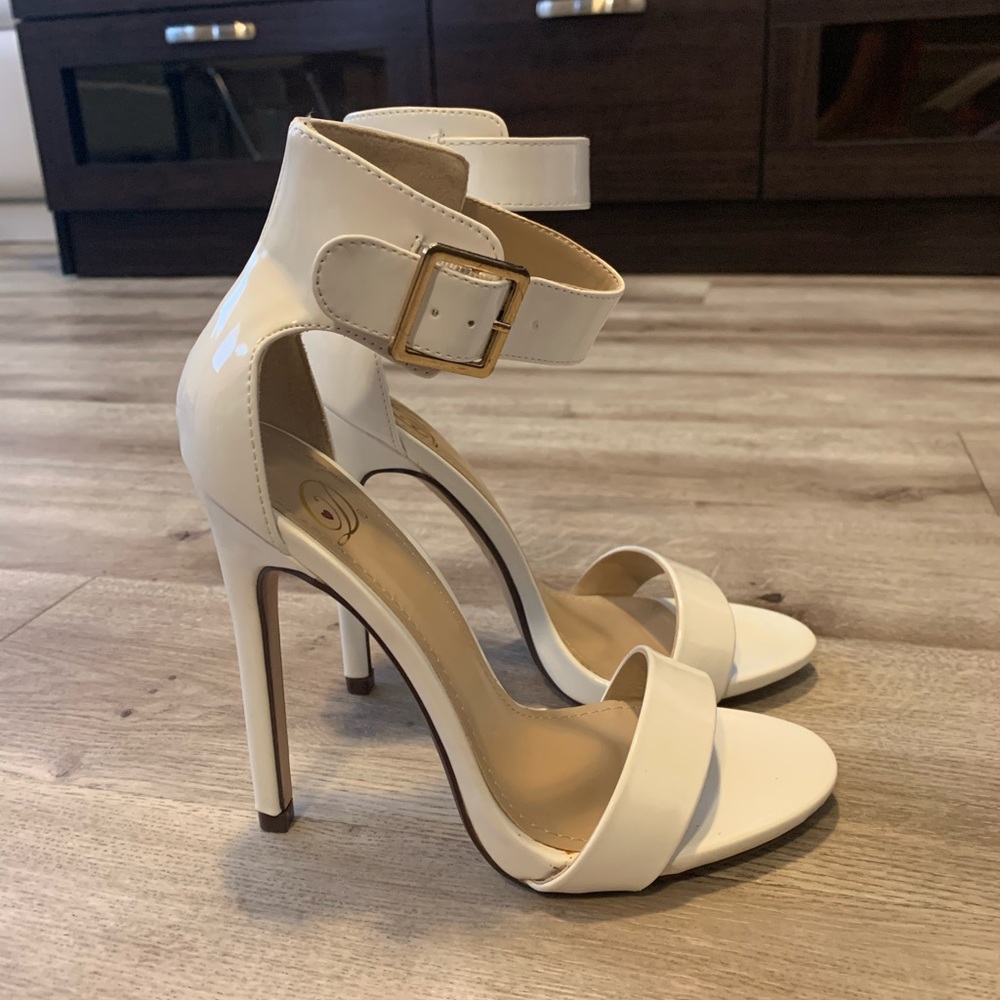 Women’s white high heels Size 9